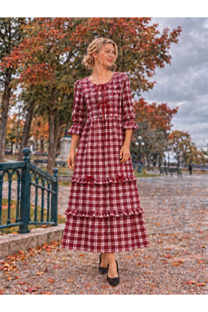 MD13277A<br/>Maxi plaid dress with 3/4 sleeves with ruffle cuffs, and delicate bow accents down the bodice.