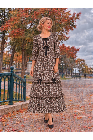 MD13277B<br/>Maxi dress with 3/4 sleeves with ruffle cuffs, and delicate bow accents down the bodice.