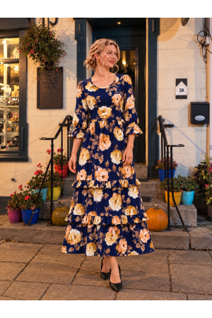 MD13277D<br/>Maxi floral dress with 3/4 sleeves with ruffle cuffs, and delicate ruffle down the bodice.